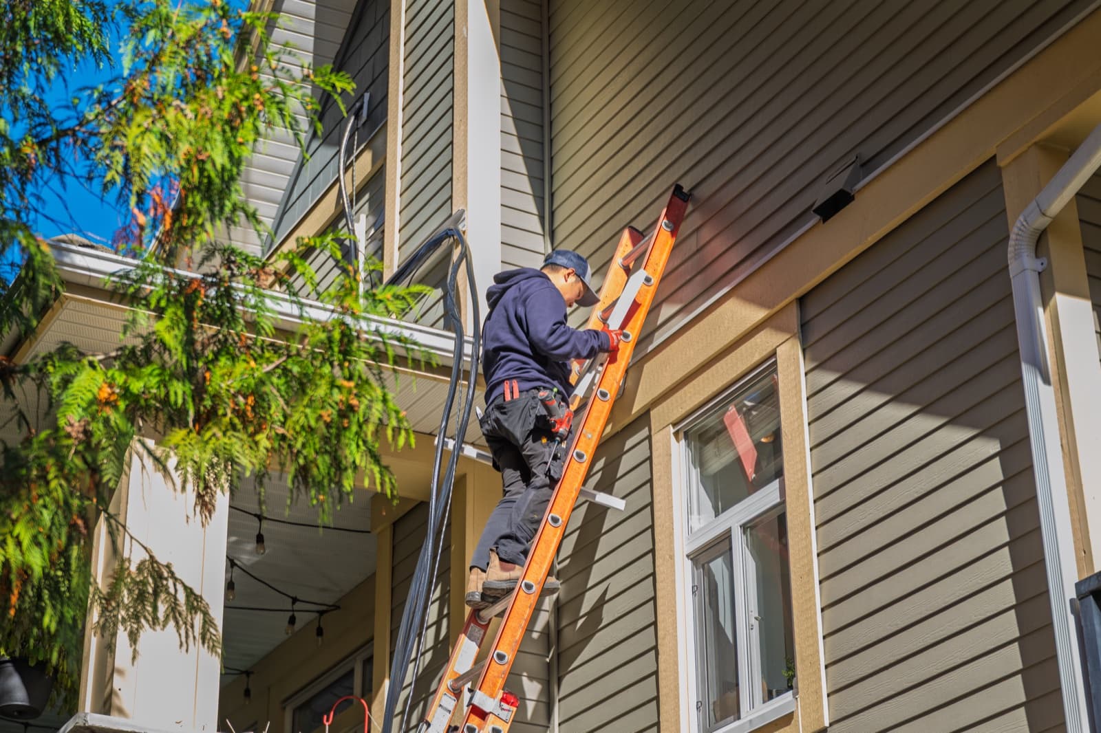 Titanium HVAC technician working on a residential install